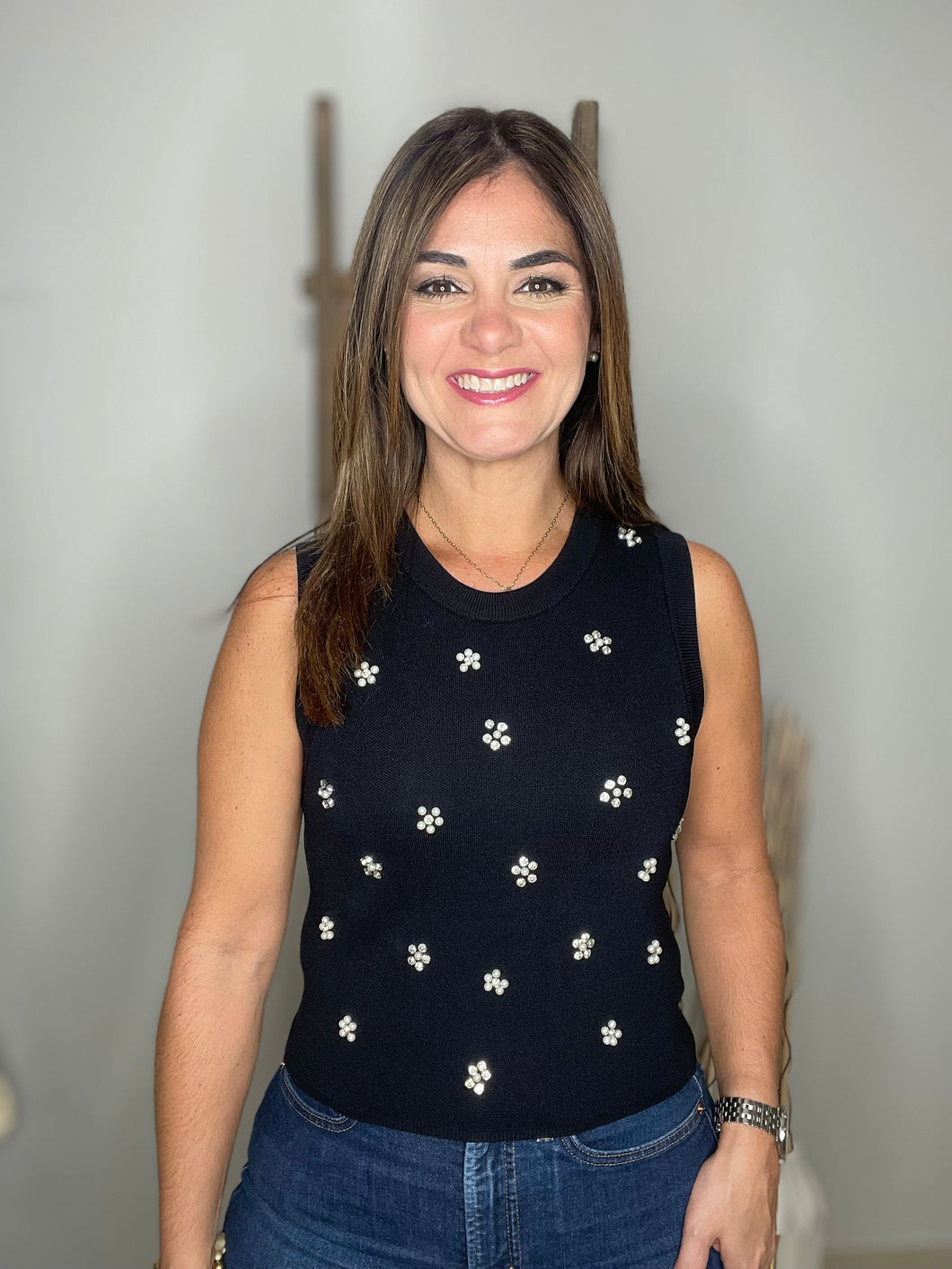 Solid sleeveless sweater knit pullover top